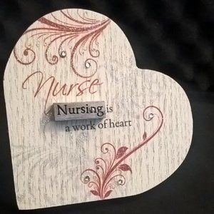Charming Plaque NURSING IS A WORK OF HEART ( Heart Shaped )
